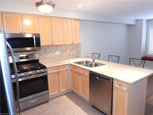 123-710 Spring Gardens Road, Burlington, ON - Indoor Photo Showing Kitchen With Double Sink