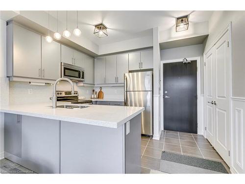 310-269 Georgian Drive, Oakville, ON - Indoor Photo Showing Kitchen With Stainless Steel Kitchen With Double Sink