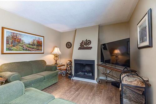 1056 Dowland Crescent, Burlington, ON - Indoor Photo Showing Living Room With Fireplace