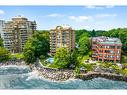 202-2210 Lakeshore Road, Burlington, ON  - Outdoor With Body Of Water With Facade 