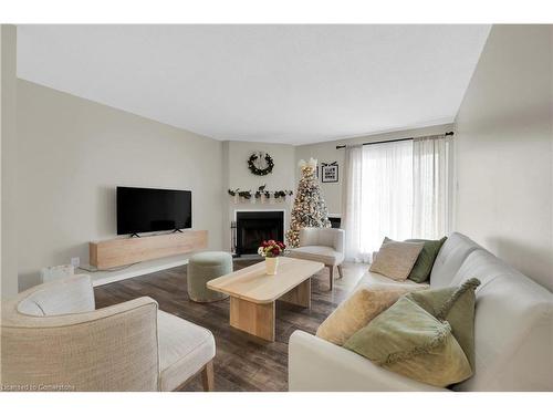 134-1496 Pilgrims Way, Oakville, ON - Indoor Photo Showing Living Room With Fireplace