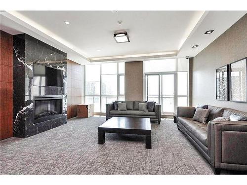 2202-4065 Brickstone Mews, Mississauga, ON - Indoor Photo Showing Living Room With Fireplace