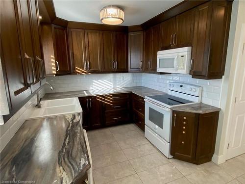 27 Idlewood Avenue, Hamilton, ON - Indoor Photo Showing Kitchen With Double Sink