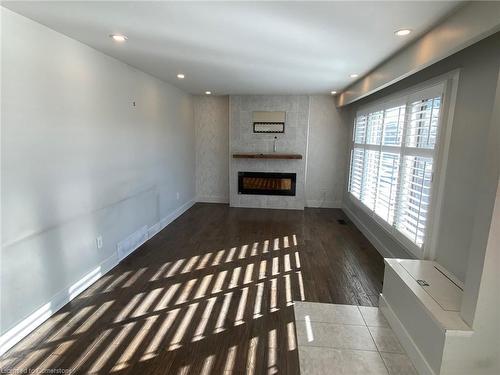 27 Idlewood Avenue, Hamilton, ON - Indoor Photo Showing Other Room With Fireplace