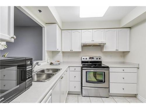 2405-100 Burloak Drive, Burlington, ON - Indoor Photo Showing Kitchen With Double Sink