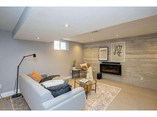 Lower-551 Barnaby Street, Hamilton, ON - Indoor With Fireplace