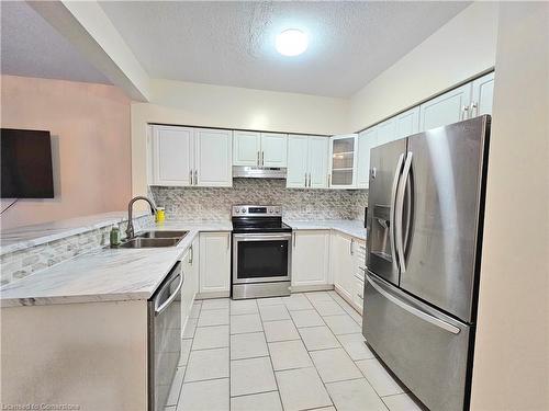 9 Hampton Brook Way Way, Hamilton, ON - Indoor Photo Showing Kitchen With Stainless Steel Kitchen With Double Sink With Upgraded Kitchen