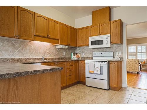 49-34 Southbrook Drive, Binbrook, ON - Indoor Photo Showing Kitchen