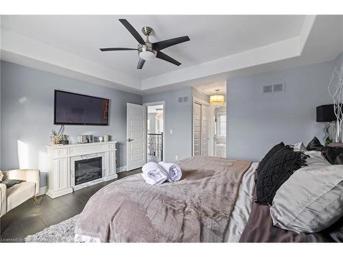 1479 Merrittville Hwy, Thorold, ON - Indoor Photo Showing Bedroom With Fireplace