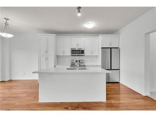 1318 Caen Avenue, Woodstock, ON - Indoor Photo Showing Kitchen With Double Sink