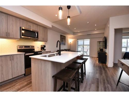 315-16 Markle Crescent, Ancaster, ON - Indoor Photo Showing Kitchen With Stainless Steel Kitchen With Double Sink With Upgraded Kitchen