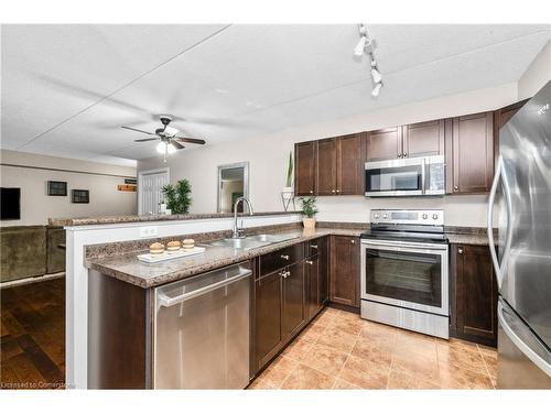 315-1451 Walker'S Line, Burlington, ON - Indoor Photo Showing Kitchen With Stainless Steel Kitchen