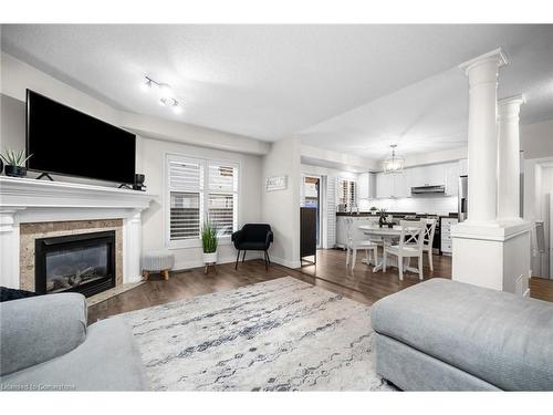 22 Southbrook Drive, Binbrook, ON - Indoor Photo Showing Living Room With Fireplace