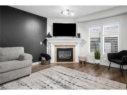 22 Southbrook Drive, Binbrook, ON - Indoor Photo Showing Living Room With Fireplace