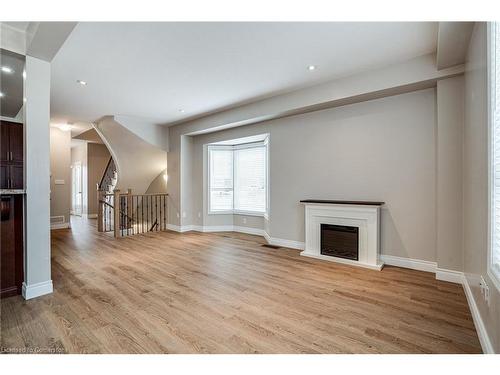 24 Marina Point Crescent, Hamilton, ON - Indoor Photo Showing Living Room With Fireplace