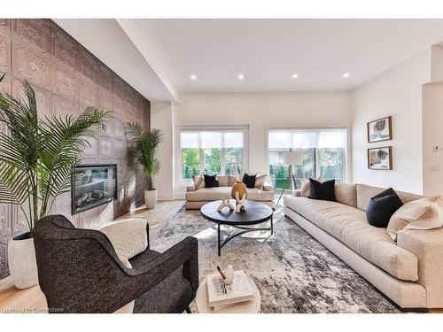 3 Arbourvale Common, St. Catharines, ON - Indoor Photo Showing Living Room With Fireplace