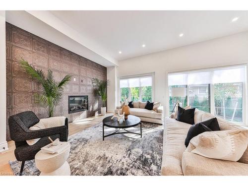 3 Arbourvale Common, St. Catharines, ON - Indoor Photo Showing Living Room With Fireplace