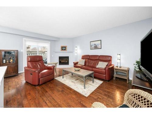 78-3333 New Street, Burlington, ON - Indoor Photo Showing Living Room With Fireplace