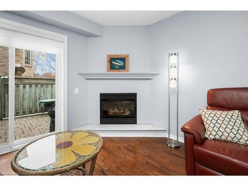 78-3333 New Street, Burlington, ON - Indoor Photo Showing Living Room With Fireplace