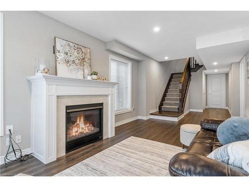 28 Pierre Trudeau Lane, Grimsby, ON - Indoor Photo Showing Living Room With Fireplace