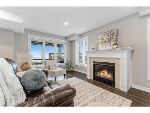 28 Pierre Trudeau Lane, Grimsby, ON - Indoor Photo Showing Living Room With Fireplace