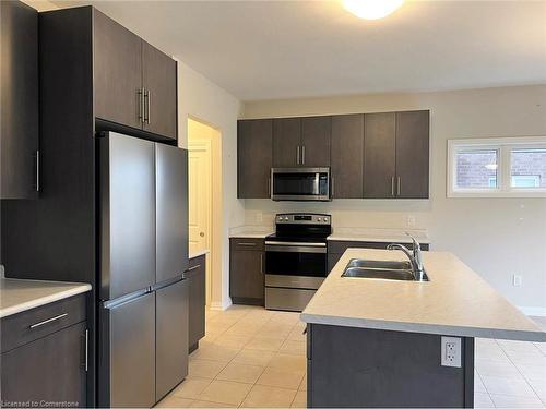 9320 White Oak Avenue, Niagara Falls, ON - Indoor Photo Showing Kitchen With Stainless Steel Kitchen With Double Sink