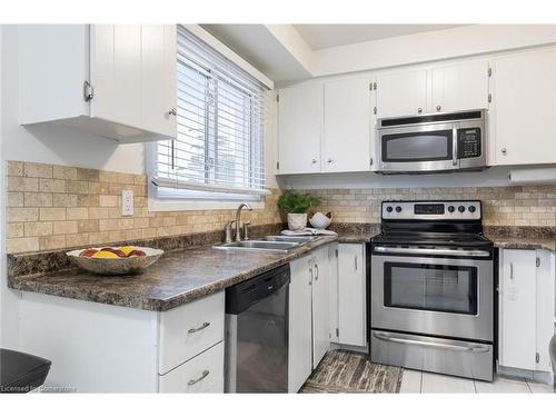 100-11 Harrisford Street, Hamilton, ON - Indoor Photo Showing Kitchen With Stainless Steel Kitchen With Double Sink