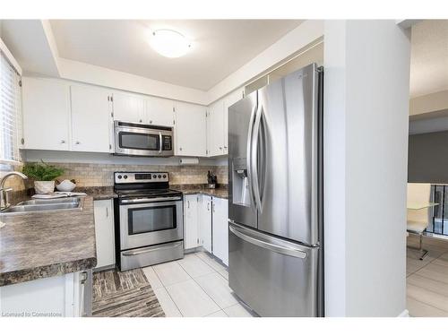 100-11 Harrisford Street, Hamilton, ON - Indoor Photo Showing Kitchen With Stainless Steel Kitchen With Double Sink