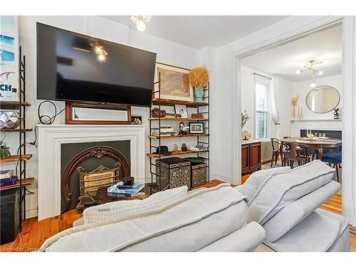 85 Barton Street W, Hamilton, ON - Indoor Photo Showing Living Room With Fireplace