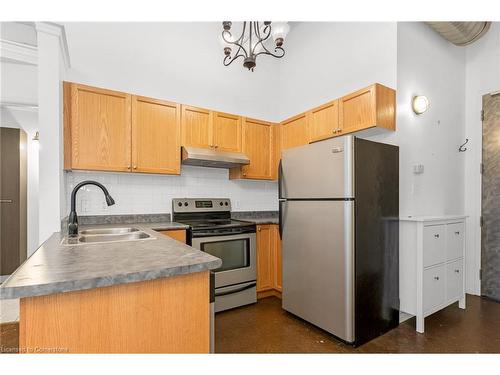 304-11 Rebecca Street, Hamilton, ON - Indoor Photo Showing Kitchen With Double Sink