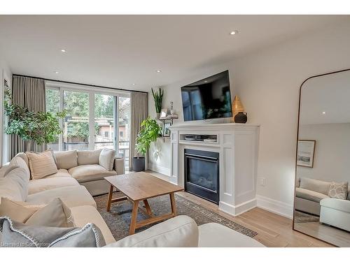 14 Bowsprit Avenue, Toronto, ON - Indoor Photo Showing Living Room With Fireplace