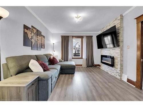 53 1/2 Robins Avenue, Hamilton, ON - Indoor Photo Showing Living Room With Fireplace