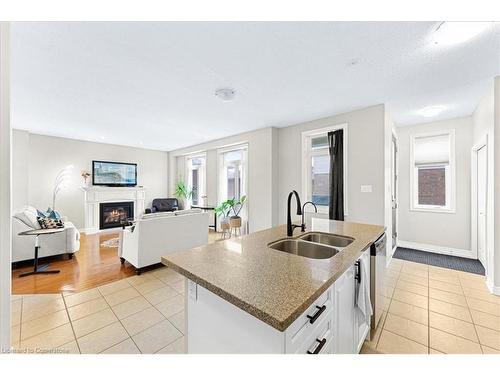 9 Tolton Drive, Guelph, ON - Indoor Photo Showing Kitchen With Fireplace With Double Sink