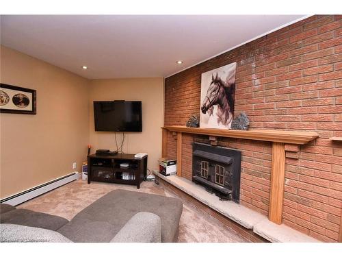 888 Mckenzie Road, Oneida, ON - Indoor Photo Showing Other Room With Fireplace