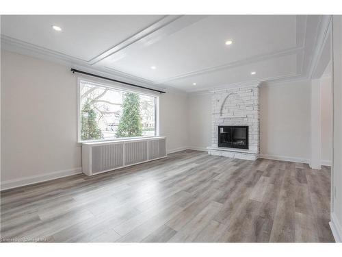 1008 Haist Street, Fonthill, ON - Indoor Photo Showing Living Room With Fireplace