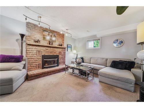 8 Muscot Drive, Hamilton, ON - Indoor Photo Showing Living Room With Fireplace