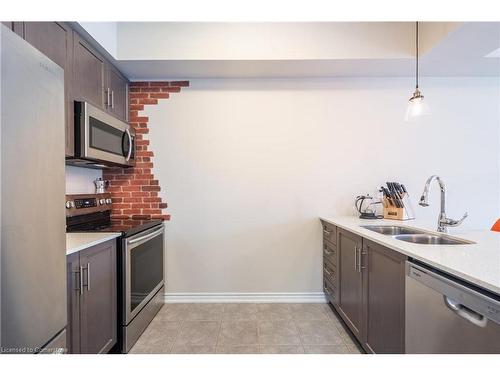 57-377 Glancaster Road, Ancaster, ON - Indoor Photo Showing Kitchen With Stainless Steel Kitchen With Double Sink