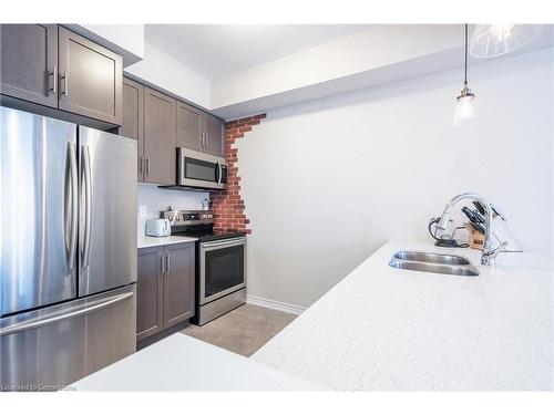 57-377 Glancaster Road, Ancaster, ON - Indoor Photo Showing Kitchen With Stainless Steel Kitchen With Double Sink