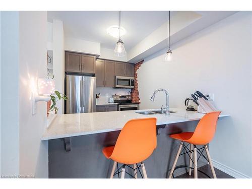 57-377 Glancaster Road, Ancaster, ON - Indoor Photo Showing Kitchen With Stainless Steel Kitchen With Double Sink