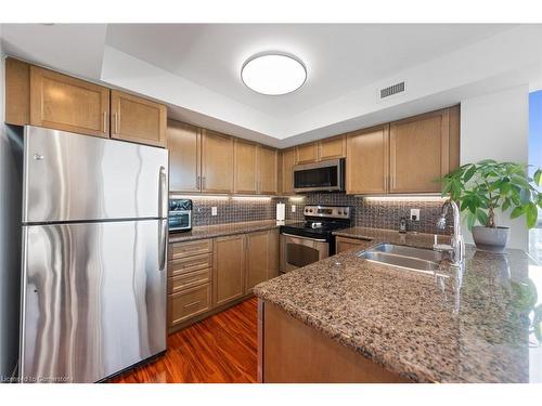 2012-335 Rathburn Road W, Peel, ON - Indoor Photo Showing Kitchen With Stainless Steel Kitchen With Double Sink