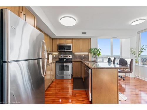 2012-335 Rathburn Road W, Peel, ON - Indoor Photo Showing Kitchen With Stainless Steel Kitchen