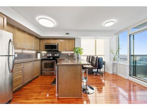 2012-335 Rathburn Road W, Peel, ON - Indoor Photo Showing Kitchen With Stainless Steel Kitchen