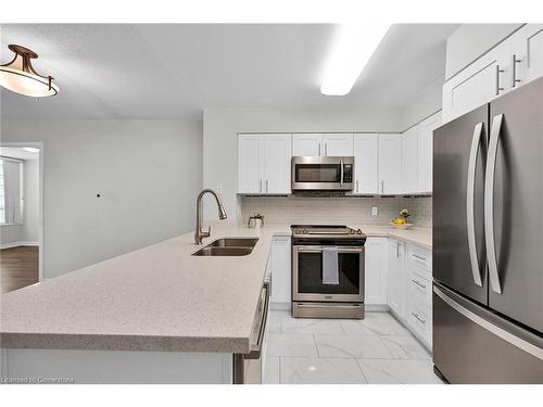 709-30 Grand Trunk Crescent, Toronto, ON - Indoor Photo Showing Kitchen With Double Sink