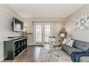 310-1800 Walkers Line, Burlington, ON  - Indoor Photo Showing Living Room 