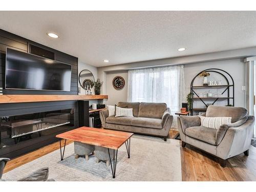 19 Tisdale Court, Kitchener, ON - Indoor Photo Showing Living Room With Fireplace