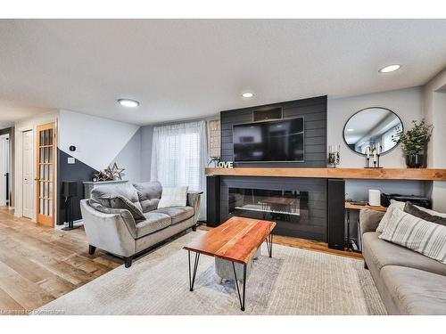 19 Tisdale Court, Kitchener, ON - Indoor Photo Showing Living Room With Fireplace