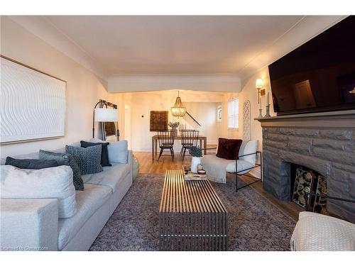 182 Huxley Avenue S, Hamilton, ON - Indoor Photo Showing Living Room With Fireplace