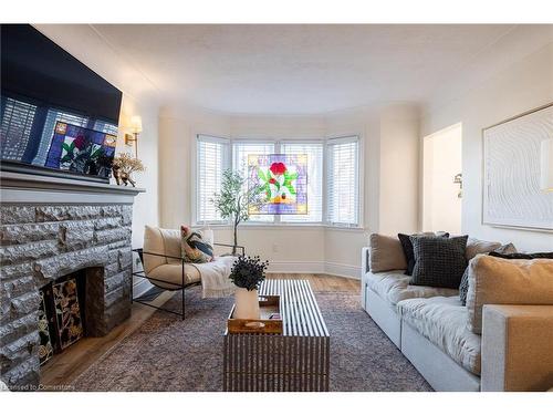 182 Huxley Avenue S, Hamilton, ON - Indoor Photo Showing Living Room With Fireplace