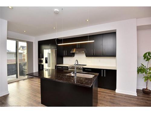 123-1890 Rymal Road E, Stoney Creek, ON - Indoor Photo Showing Kitchen With Double Sink