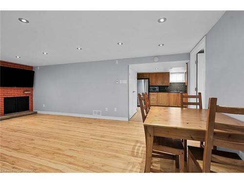 221 Gray Road, Stoney Creek, ON - Indoor Photo Showing Dining Room With Fireplace